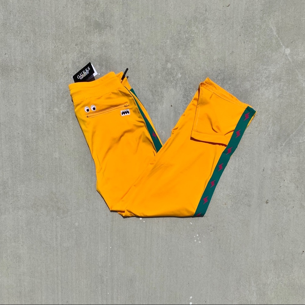 J Balvin x Guess collab track pants